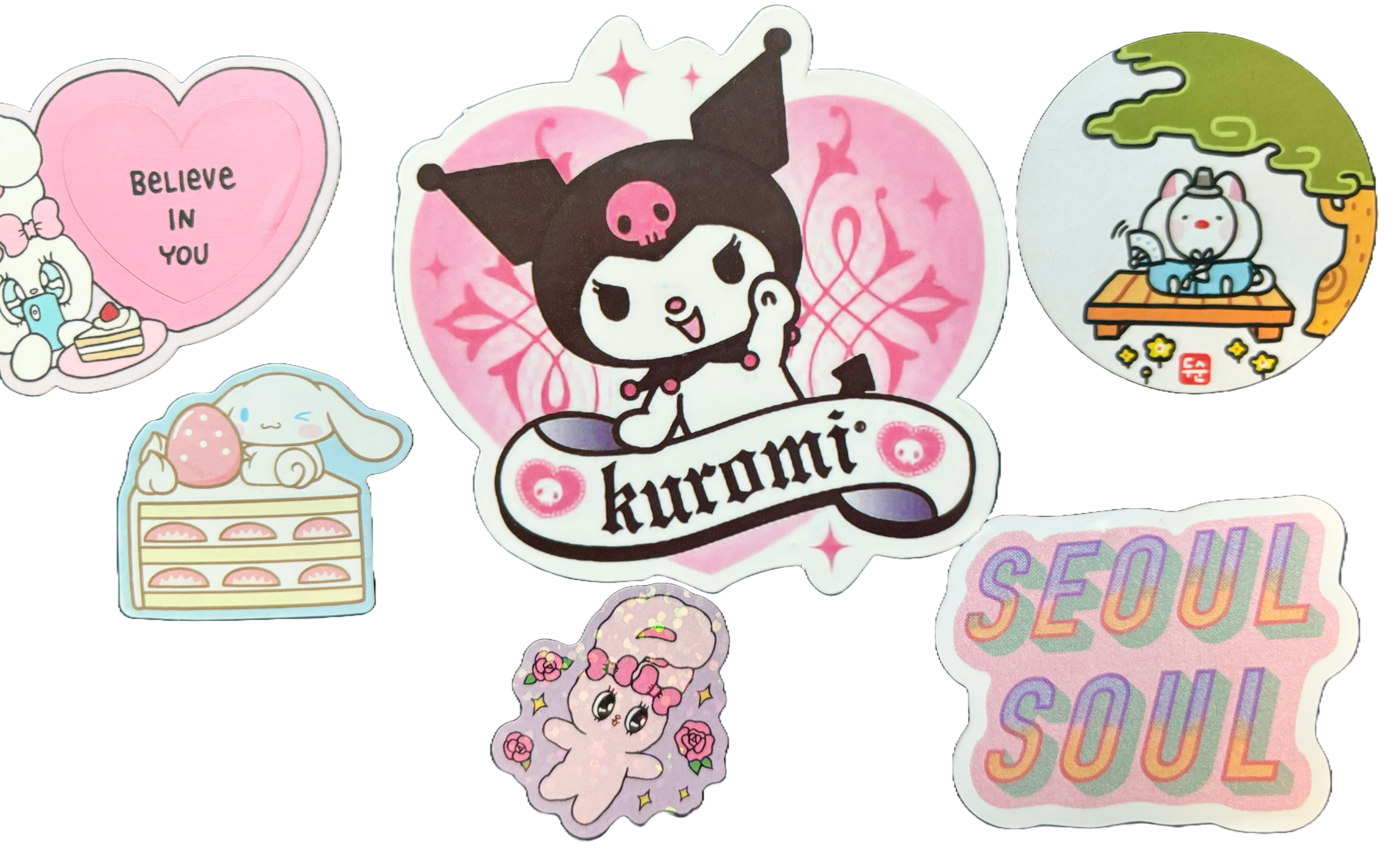 a bundle of stickers, most of which are colourful stars and hearts